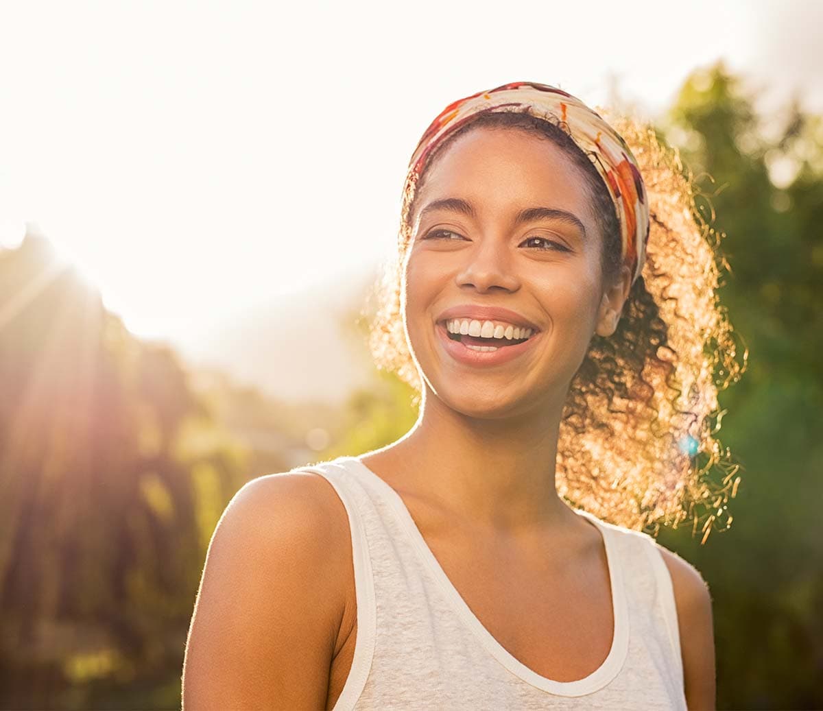Girl smiling in the sun