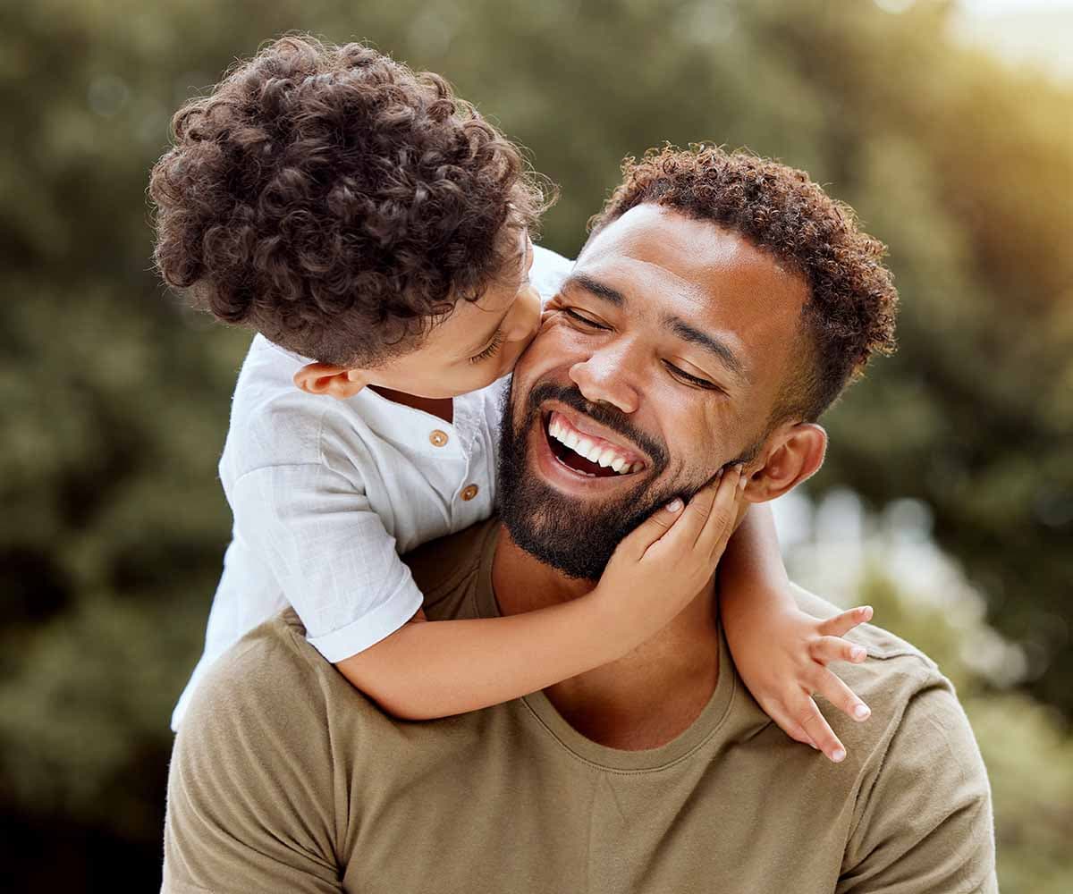 Man and son smiling