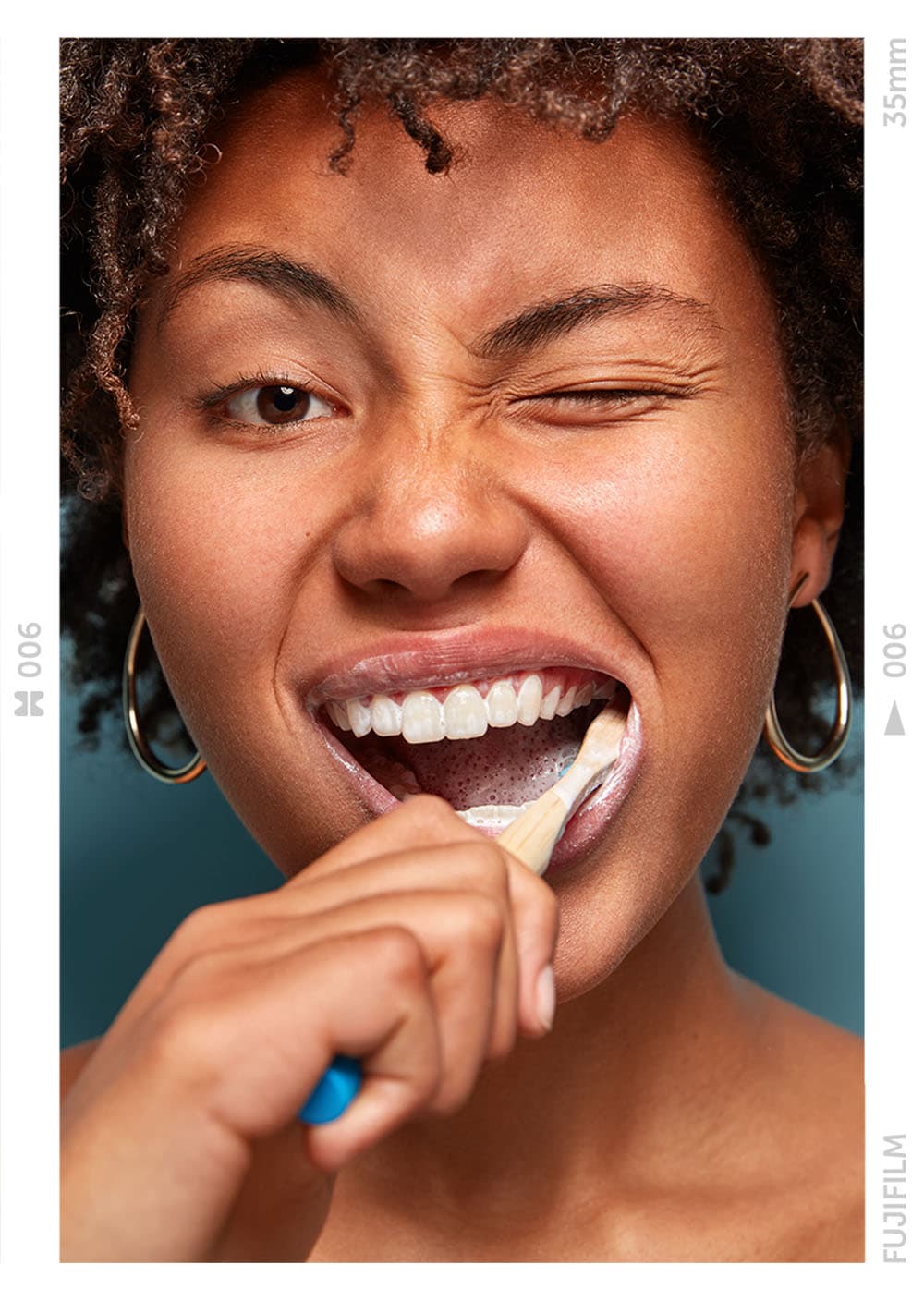 Woman brushing teeth
